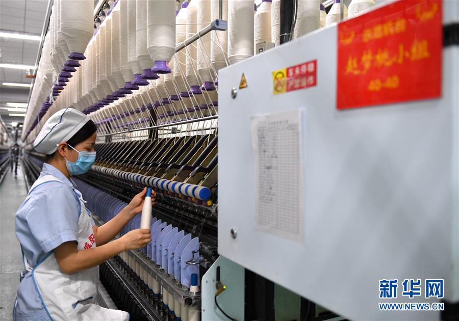 （代表委員履職）（1）全國(guó)人大代表何菲：傳承“夢(mèng)桃精神”  做新時(shí)代產(chǎn)業(yè)工人